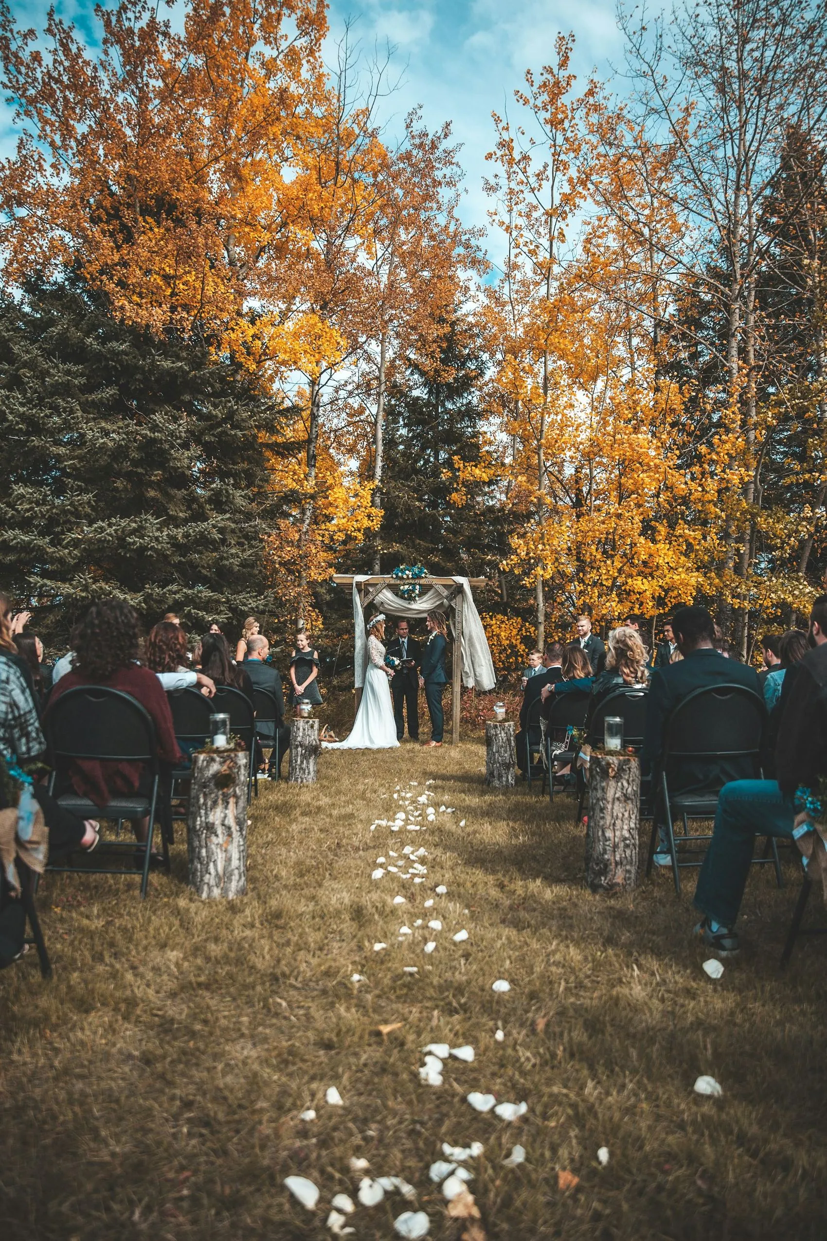 An outdoor ceremony set among autumn trees near Paarl