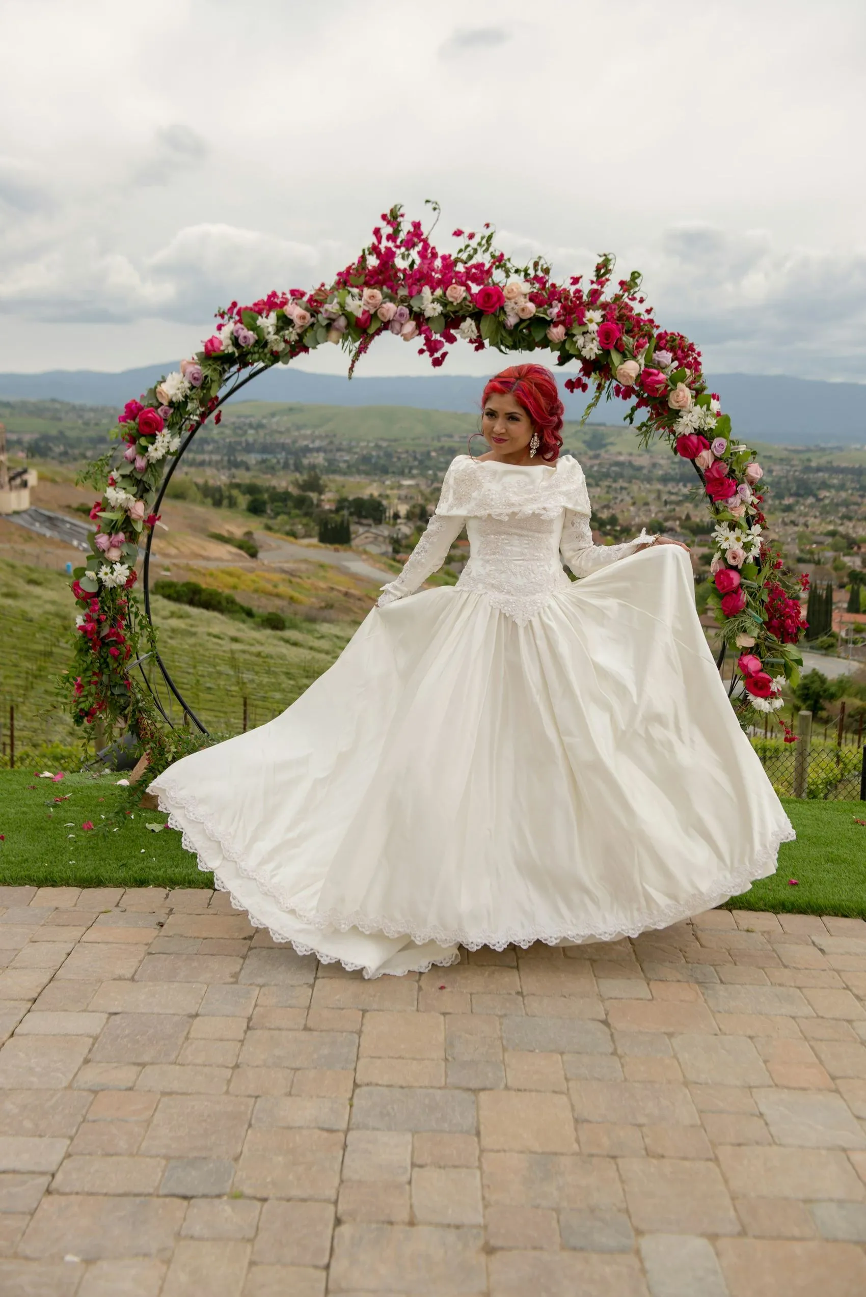 A bride in the vineyard at late afternoon